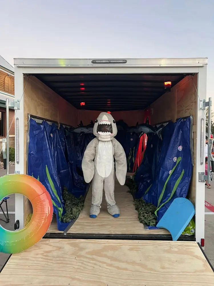 Inside the 7 x 14 ft enclosed trailer loaded with event decorations
